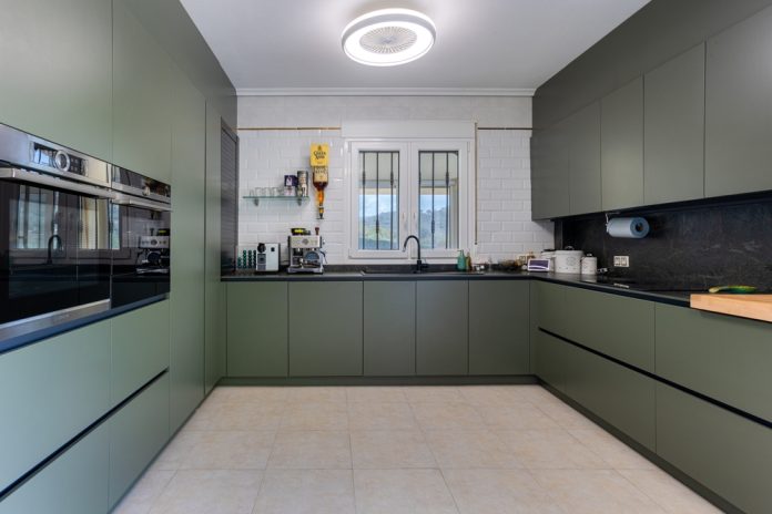 Torrevieja,Spain,24,September,2025:,Contemporary,Kitchen,Featuring,Green,Cabinetry,